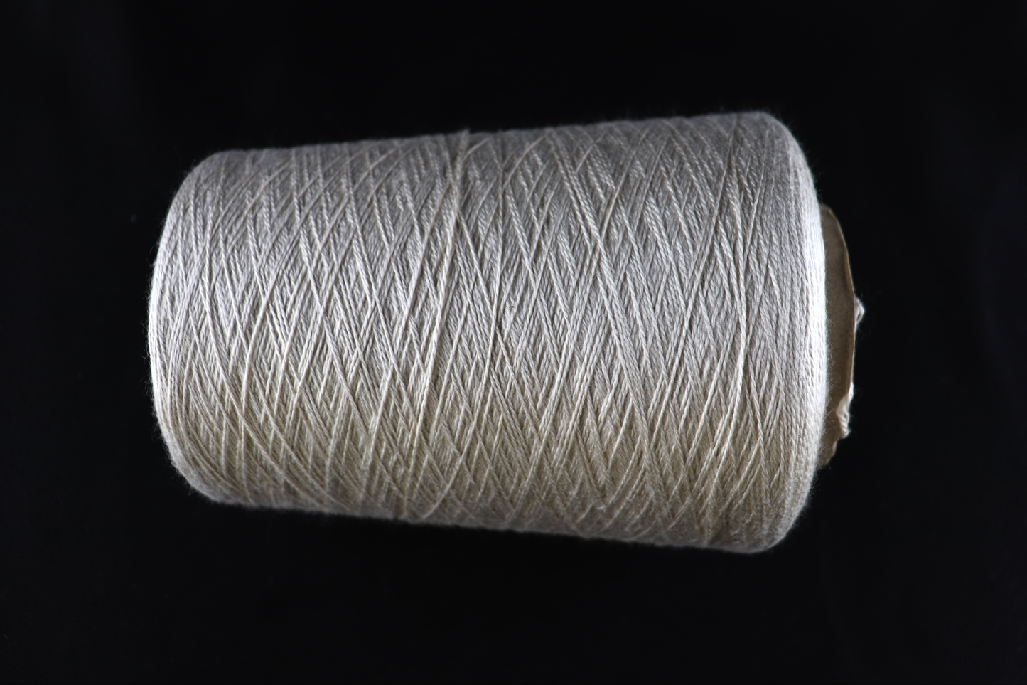 cone of white yarn