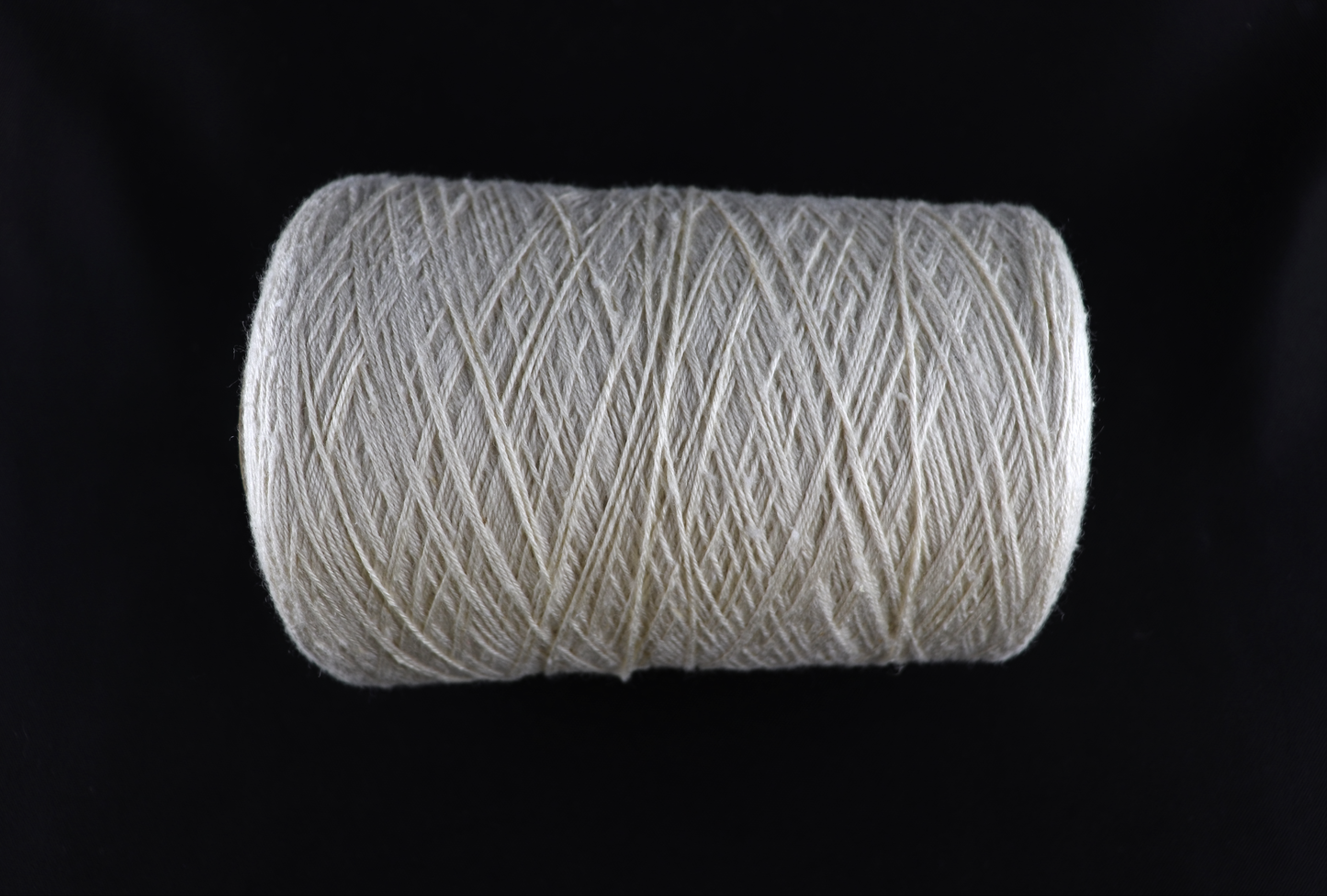 cone of white yarn