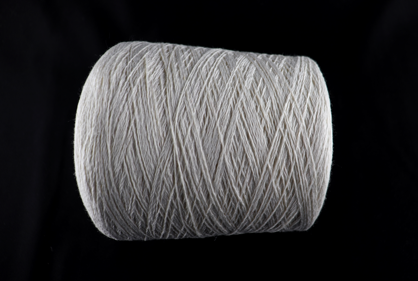 cone of white yarn