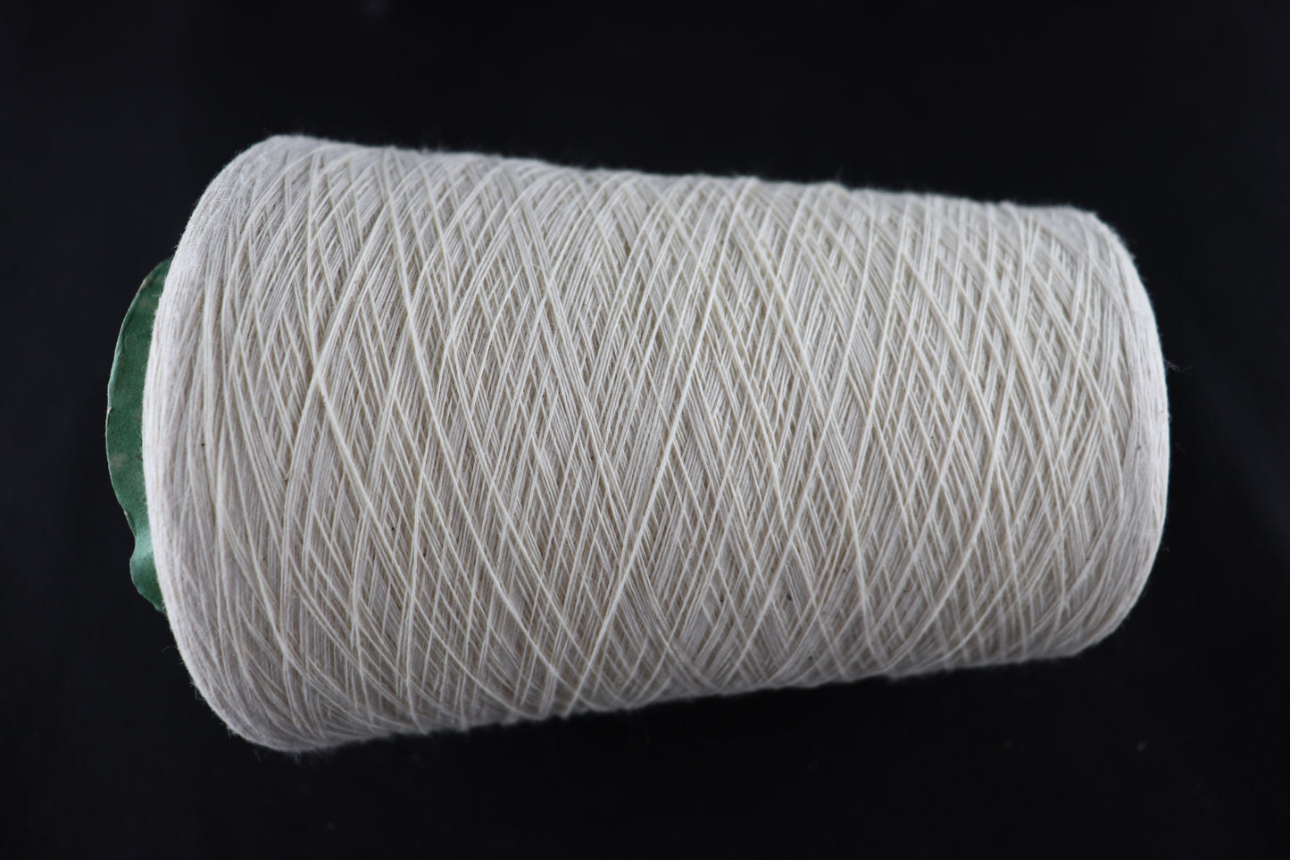 cone of white yarn
